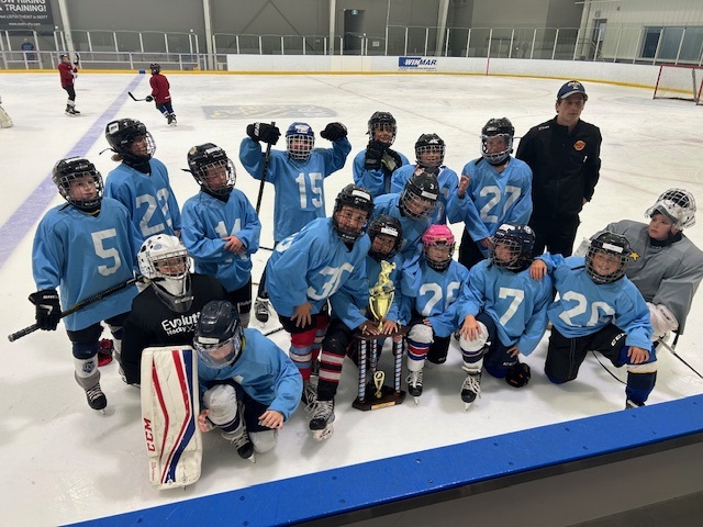 Students and instructors from past hockey camps